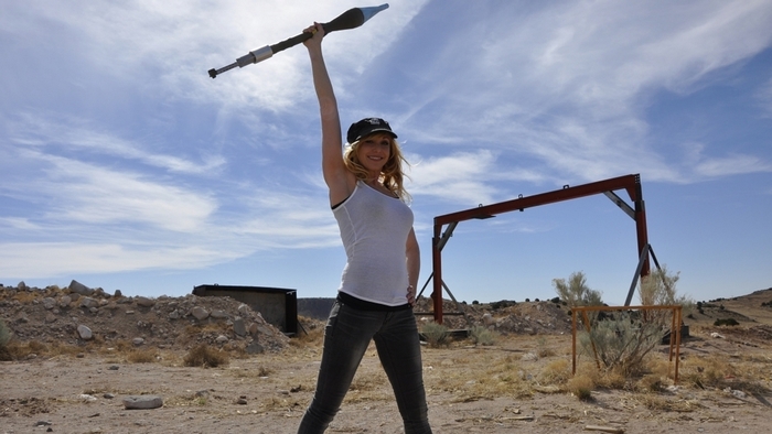 Kari Byron holding a rocket-propelled grenade launcher