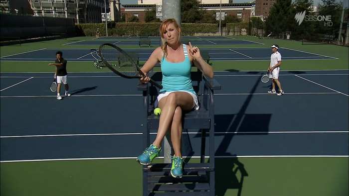 Kari Byron on a tennis court with players