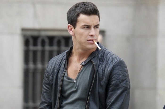 Mario Casas smoking a cigarette