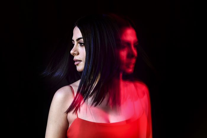 Emeraude Toubia in red dress