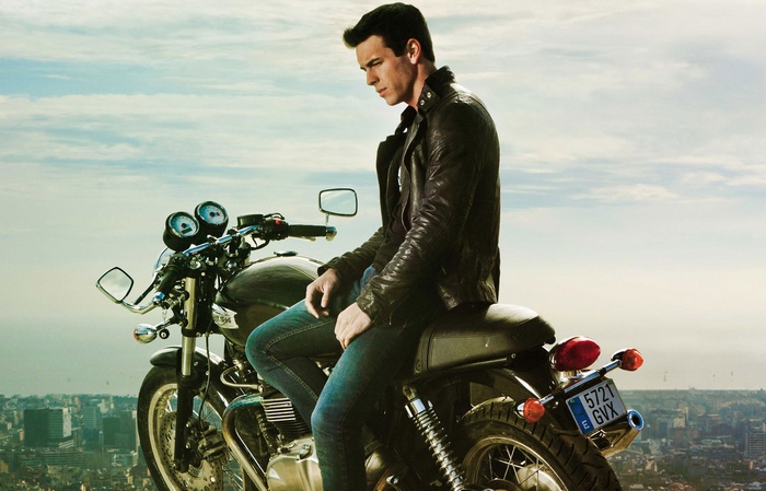 Mario Casas on a motorcycle