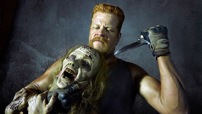 Abraham Ford from The Walking Dead holding a zombie head