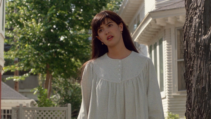 Phoebe Cates in a light blue dress