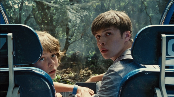 Nick Robinson and a boy in a vehicle
