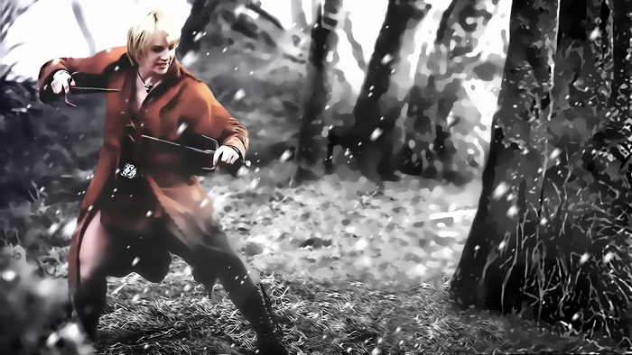 Renee O'Connor in a forest with snow