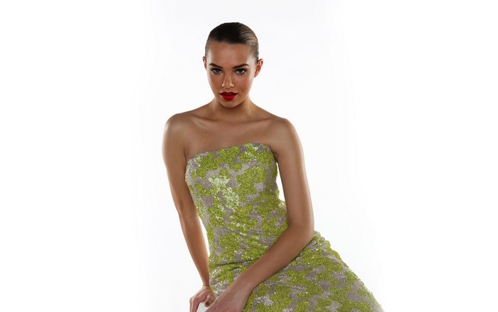 Indiana Evans in a sequined dress
