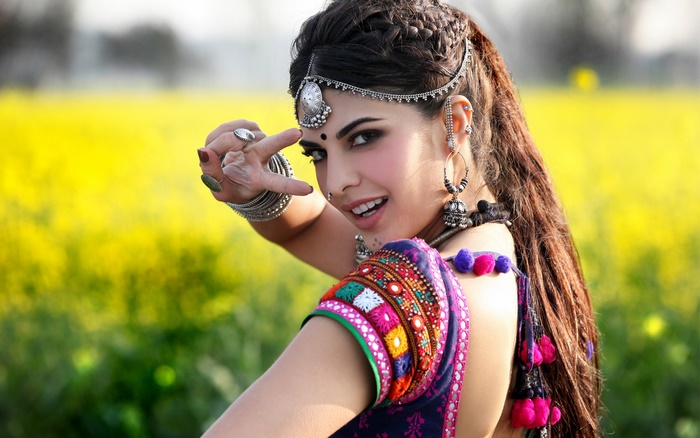 Jacqueline Fernandez in a field