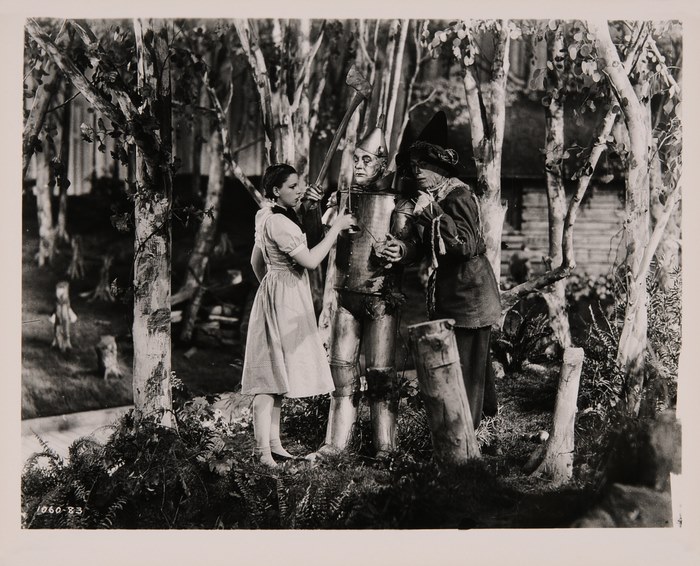 Dorothy, Tin Man, and Scarecrow in The Wizard of Oz