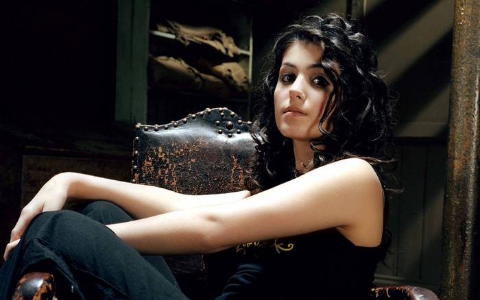 Katie Melua sitting in a chair