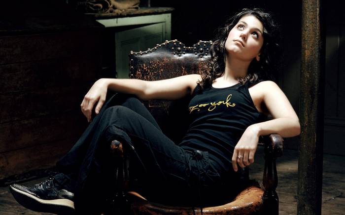 Katie Melua sitting in a chair