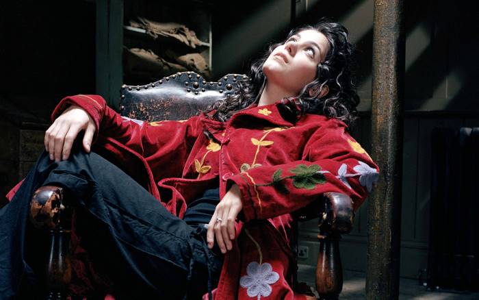 Katie Melua sitting in a chair