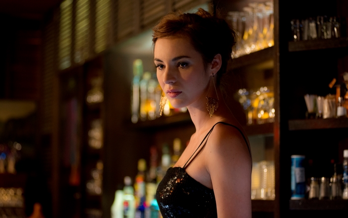 Louise Bourgoin in a black sequined dress