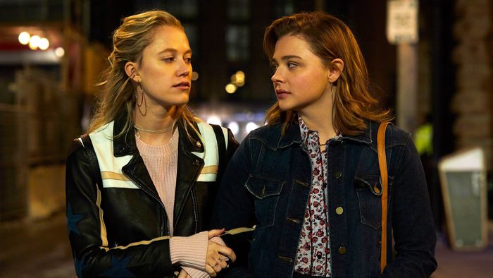 Maika Monroe and Chloe Grace Moretz walking at night