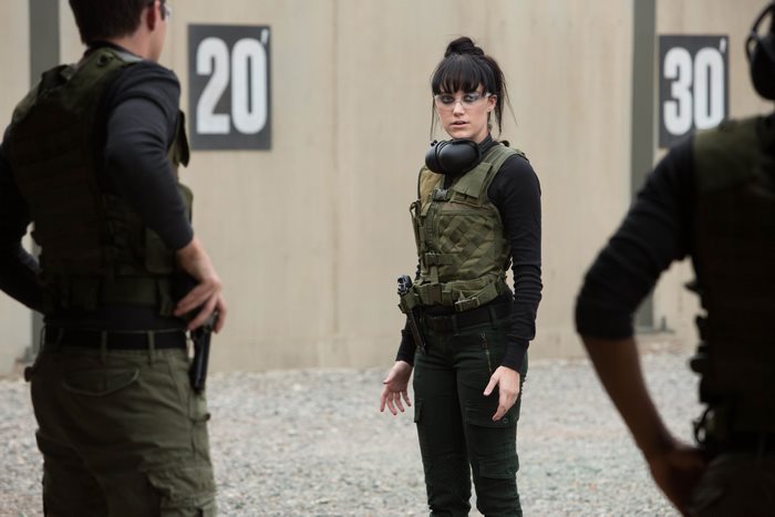 Maika Monroe at a shooting range