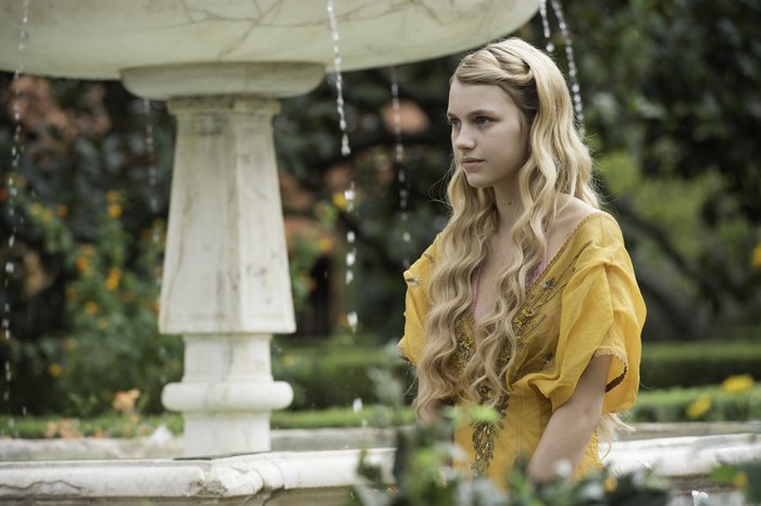 Nell Tiger Free in a yellow dress