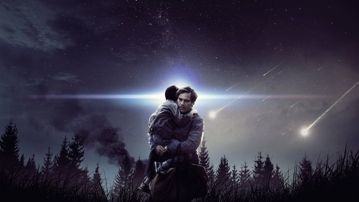 Michael Shannon holding a child under a starry sky