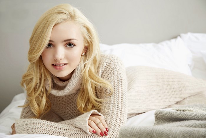 Peyton List wearing a turtleneck sweater
