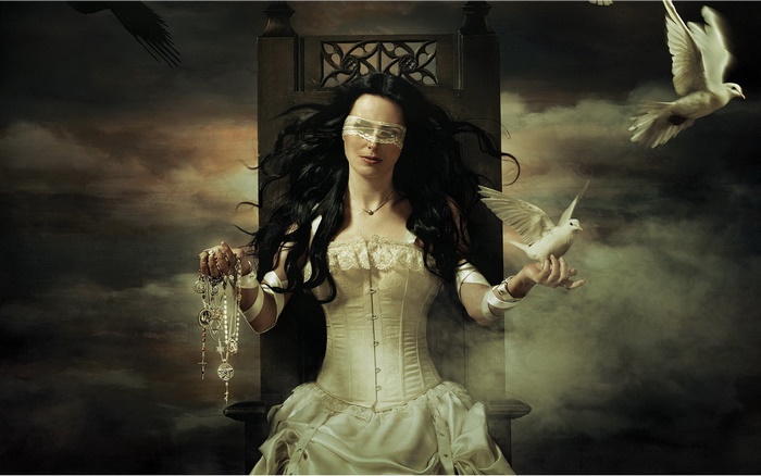 Sharon den Adel seated on a throne with doves