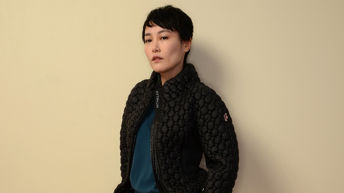 Rinko Kikuchi wearing Moncler jacket