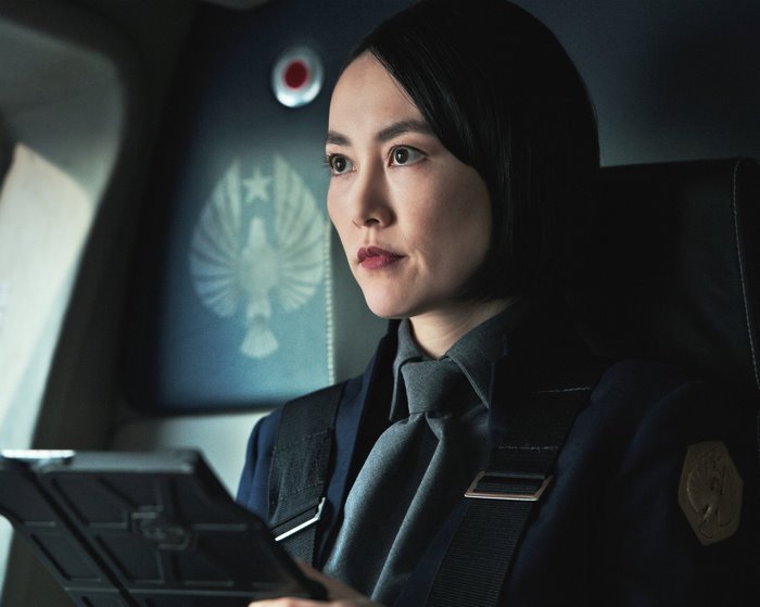 Rinko Kikuchi in a dark uniform