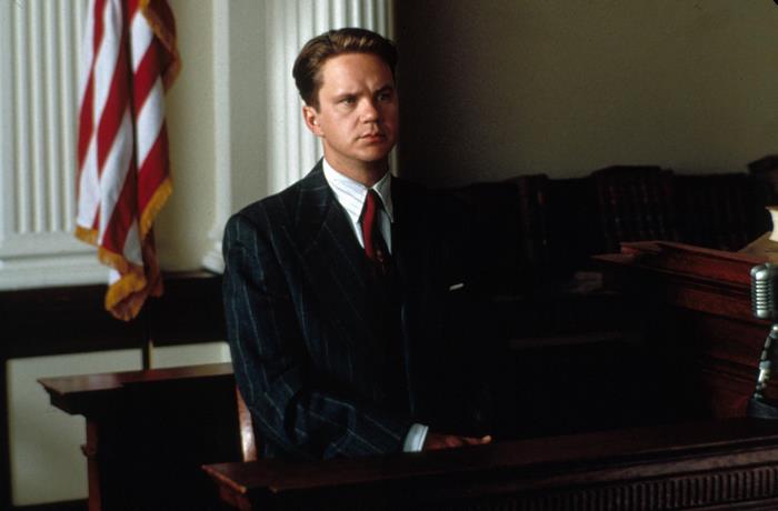 Tim Robbins in a courtroom