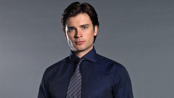 Tom Welling in a blue shirt and tie