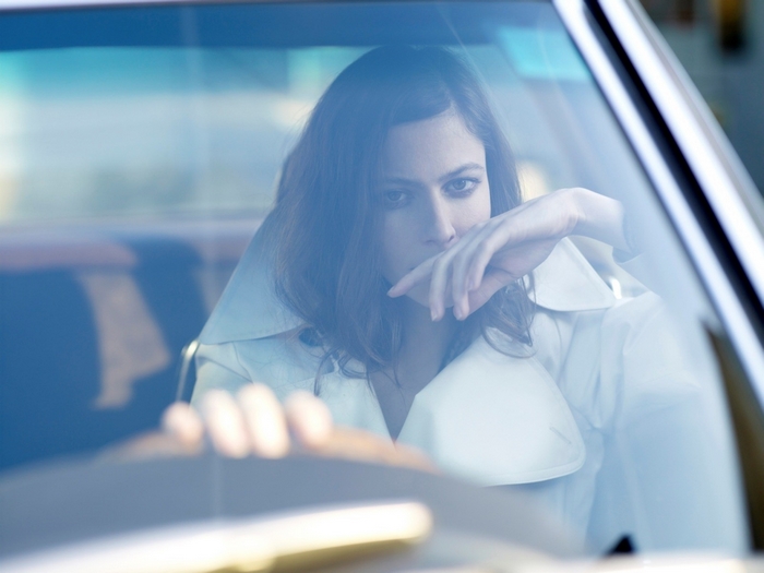 Anna Mouglalis in a car