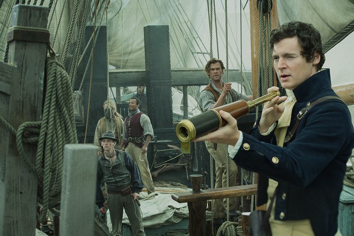 Benjamin Walker on a ship with a spyglass