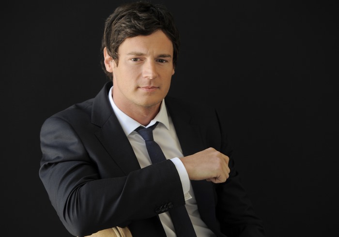 Benjamin Walker in a suit