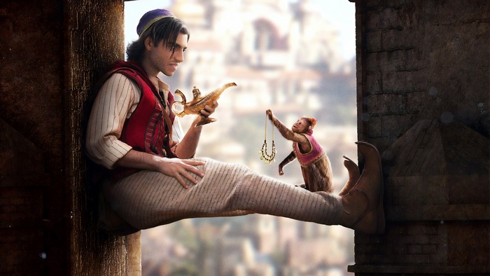 Aladdin from Aladdin holding a magic lamp with Abu
