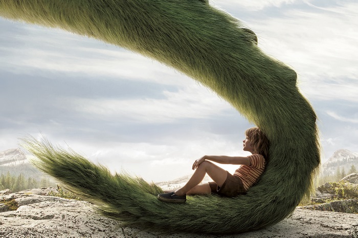 Oakes Fegley with a large green creature