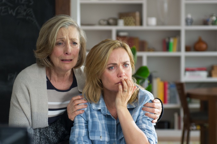 Radha Mitchell in a scene of distress