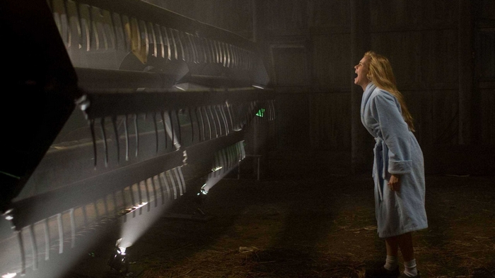 Radha Mitchell screaming at a machine