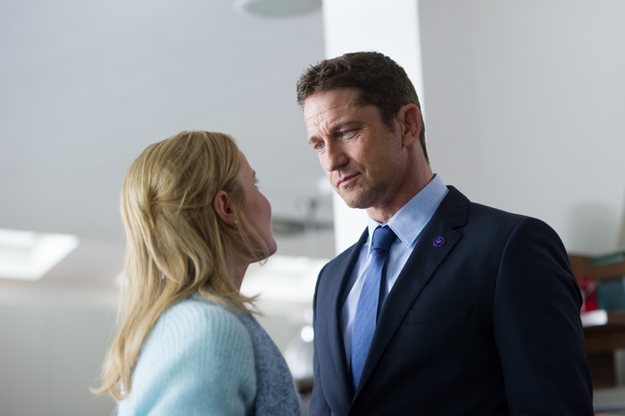 Gerard Butler and Radha Mitchell in a formal setting