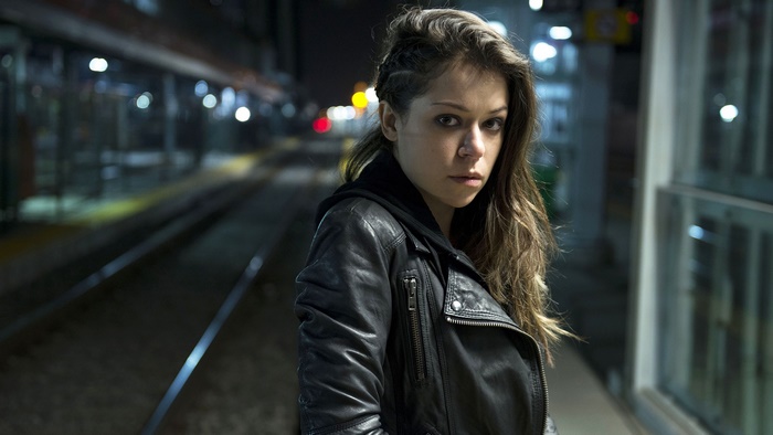 Tatiana Maslany on a train platform at night