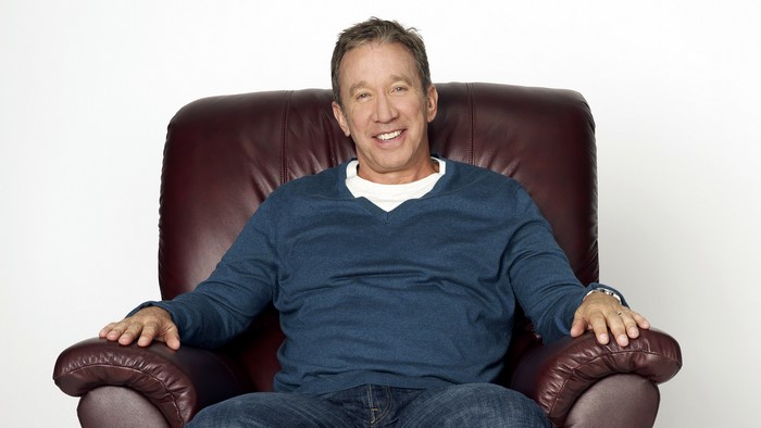 Tim Allen sitting in a leather chair