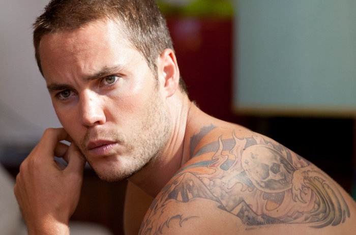 Taylor Kitsch with shoulder tattoo