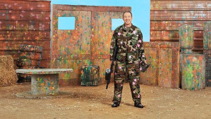 Tim Allen in camouflage at a paintball field