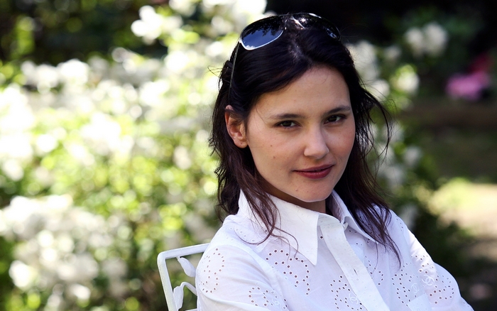 Virginie Ledoyen in white shirt with sunglasses