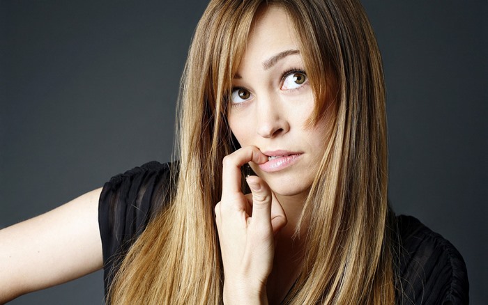 Autumn Reeser biting her finger