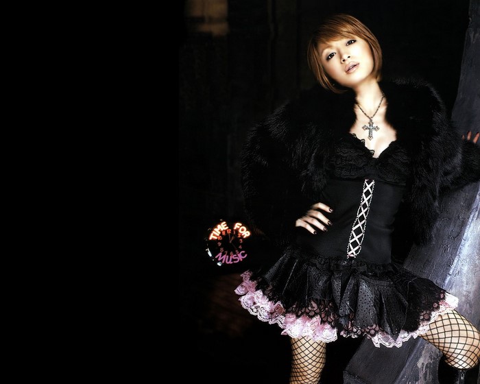 Ayumi Hamasaki in black fur coat and dress