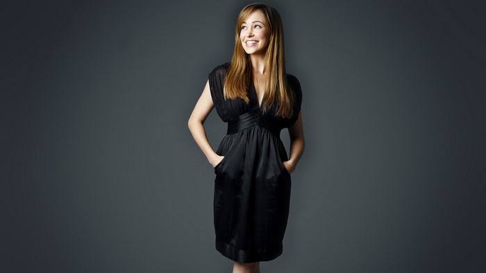 Autumn Reeser in a black dress