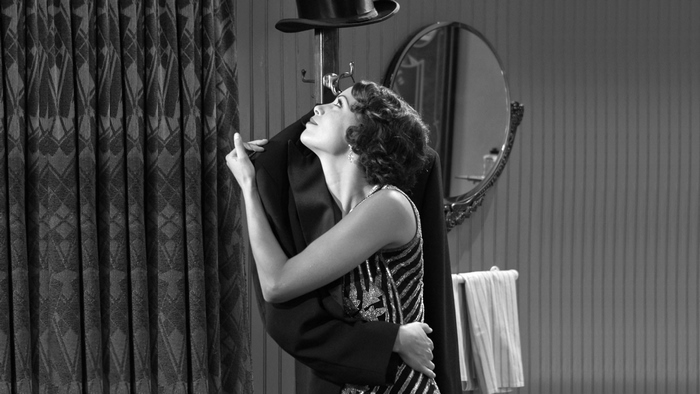 Bérénice Bejo in a black tuxedo and sequined dress