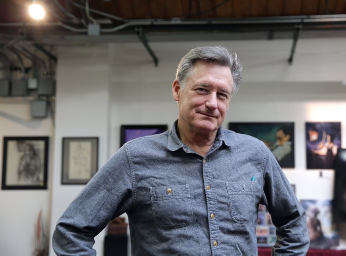 Bill Pullman in an art gallery