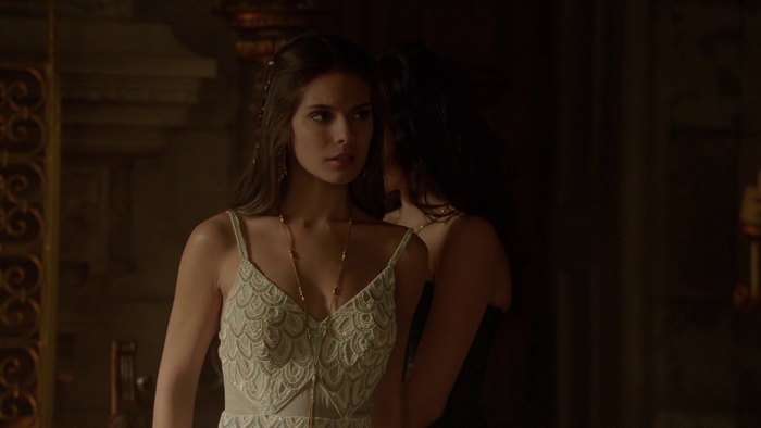 Caitlin Stasey in a white dress