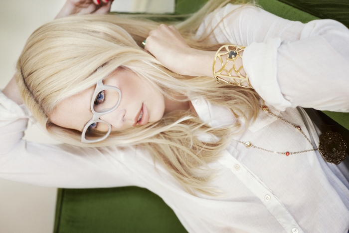 Claudia Schiffer wearing glasses and jewelry