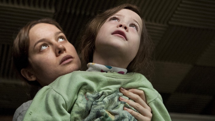 Brie Larson and Jacob Tremblay looking up