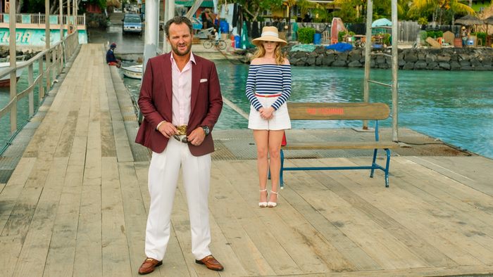 Jason Clarke and a woman on a pier