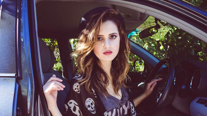 Laura Marano in a car