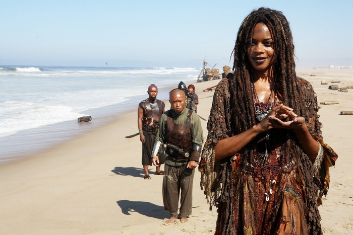 Naomie Harris and crew on a beach